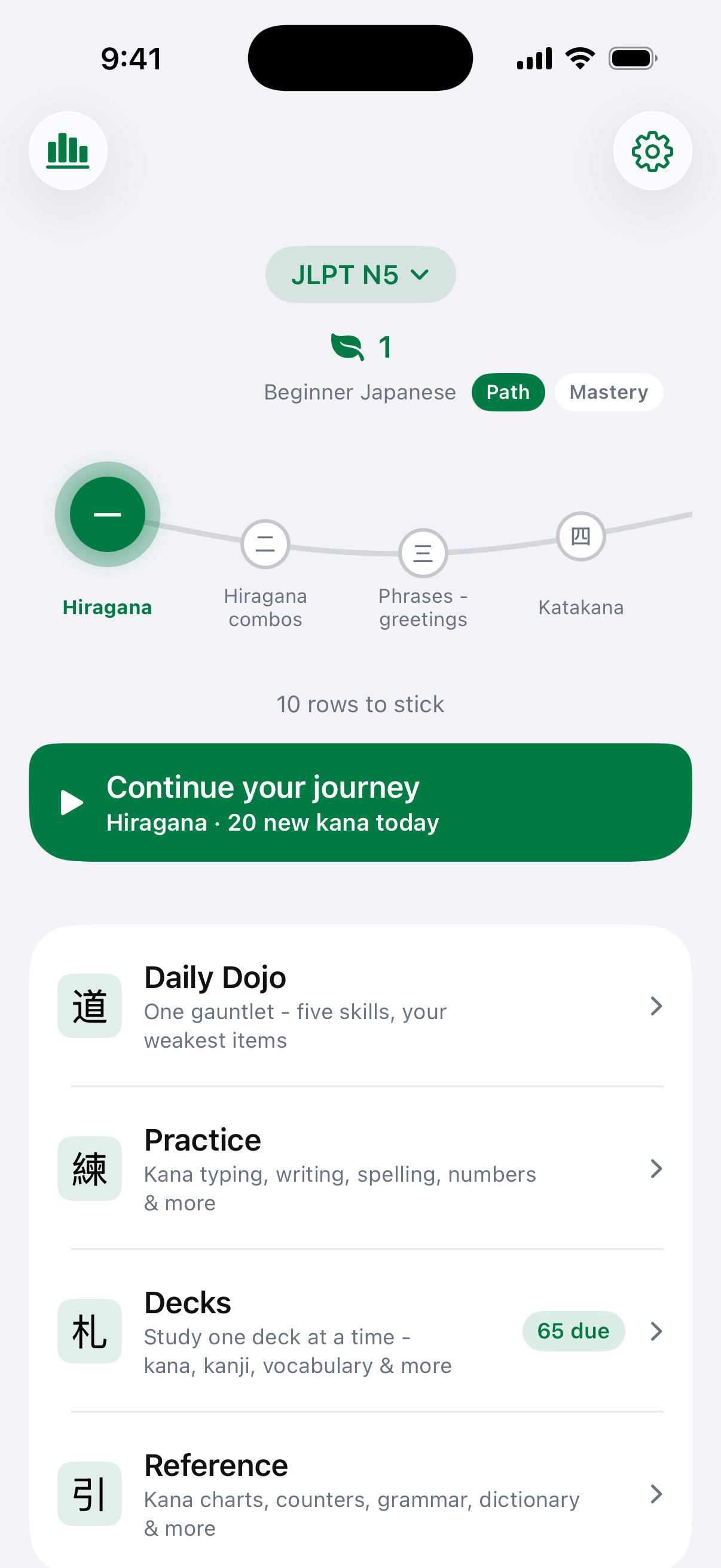 Kaitaku's home screen: the learning path with Hiragana active, a continue button offering today's new kana, and rows for Daily Dojo, Practice, Decks, and Reference